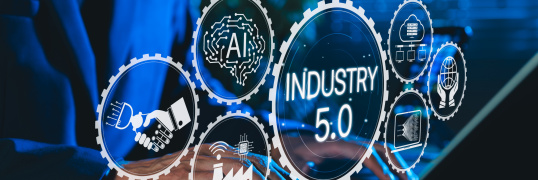 Industry 5.0 Concept. Person using laptop with Industry 5.0, AI icons, smart factory, connectivity, advanced technology integration, human machine collaboration, and future of industrial innovation.